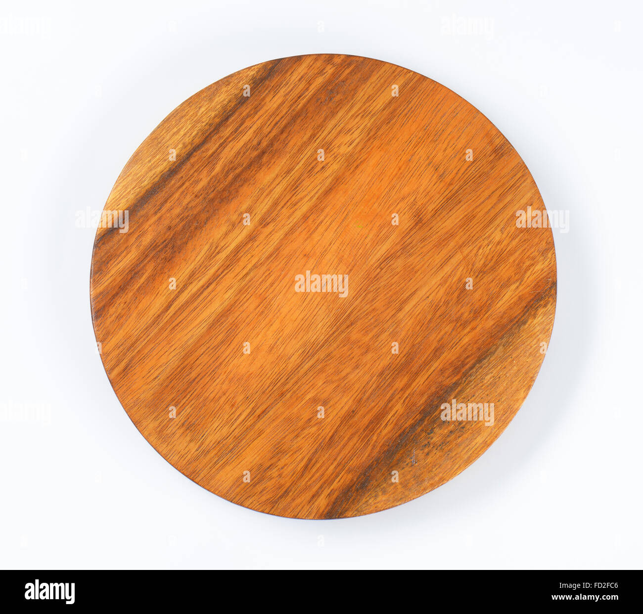 round wood chopping board on white background Stock Photo Alamy