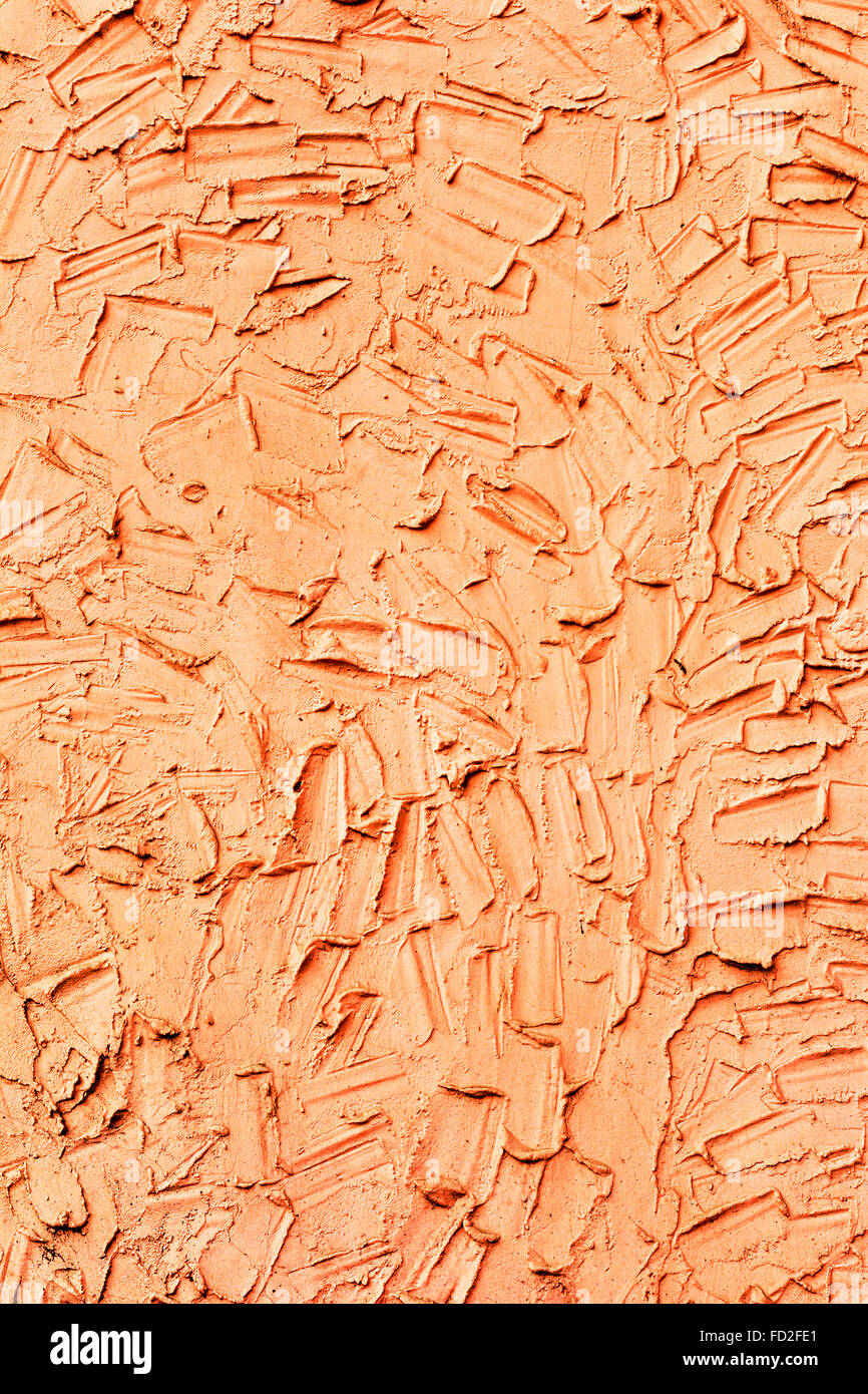 Creative beautiful bright orange background, cracks and scratches on the concrete. Grungy concrete surface. Great background or Stock Photo