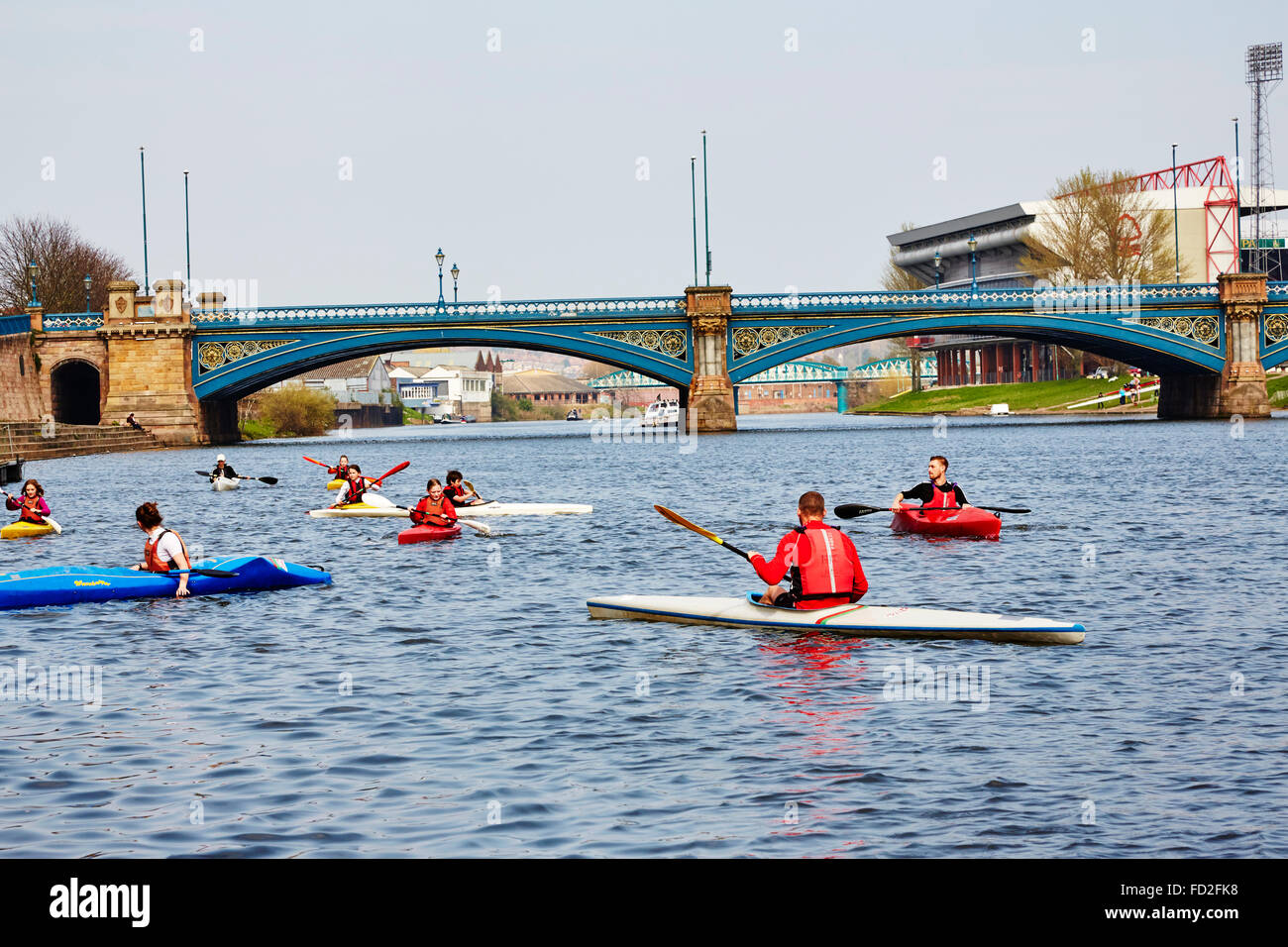 People kayaking on the River Trent near Trent Bridge, Nottingham