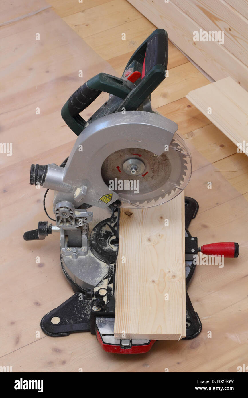 Circular saw standing on the floor photo Stock Photo Alamy