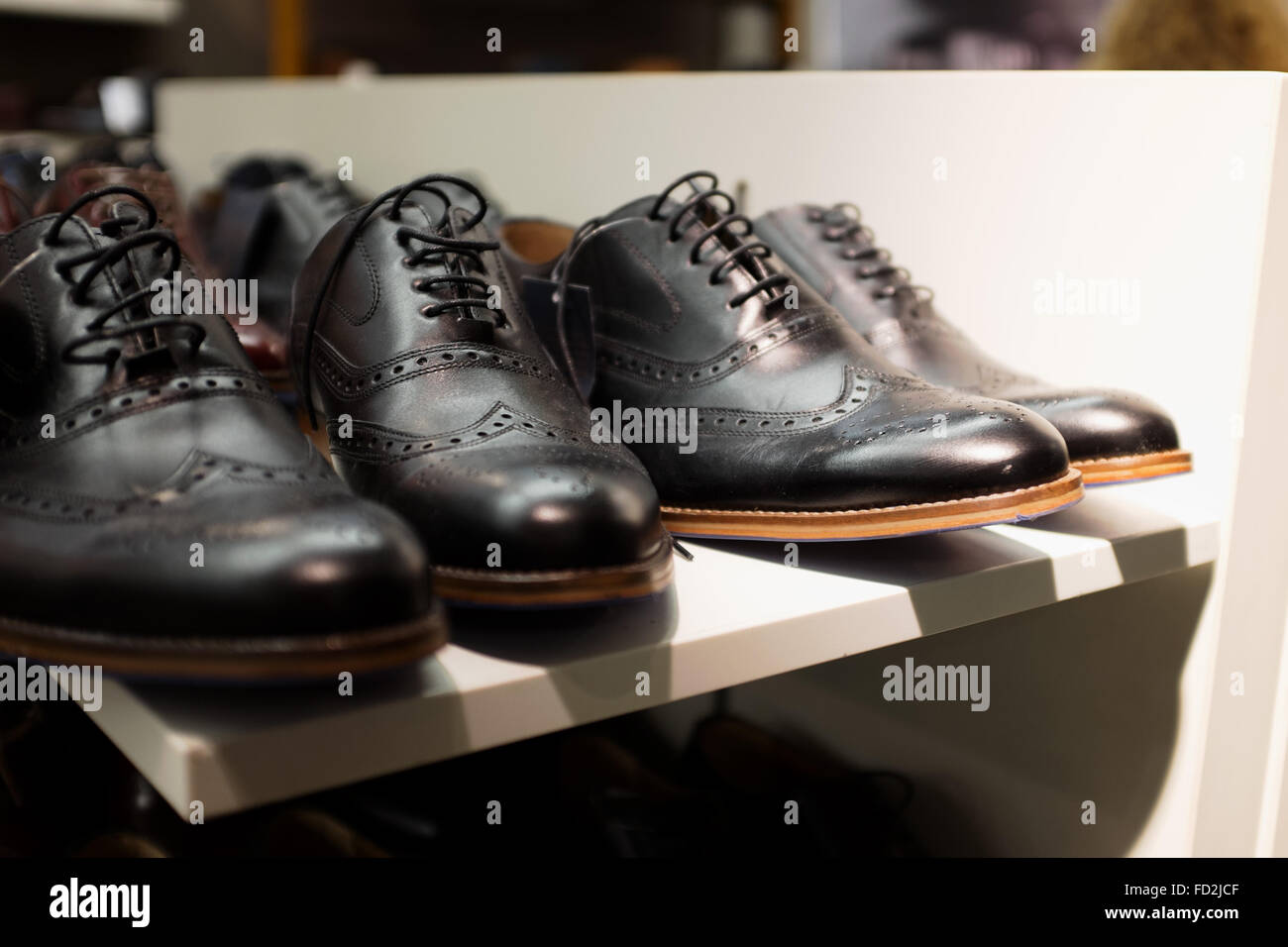 Black brogue shoes at Marks & Spencer department store UK Stock Photo