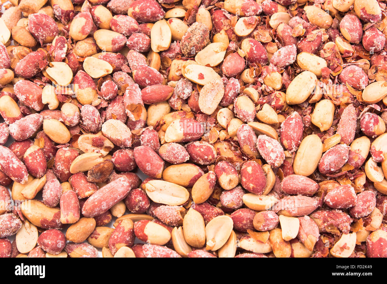 Peanuts, salted, baked, as background. Stock Photo