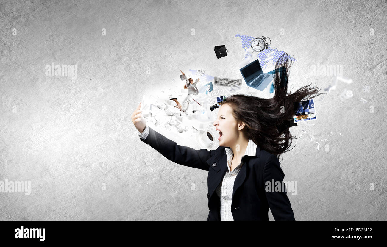 Stock Peope Raging Young businesswoman screaming with rage in mobile phone Stock Photo - Alamy