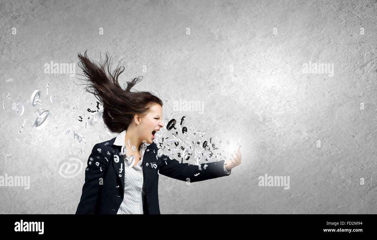 Stock Peope Raging Young businesswoman screaming with rage in mobile phone Stock Photo - Alamy
