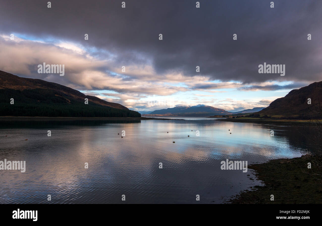 Reflections of Winter Morning Light on Loch Ainort on the Isle of Skye, Scotland UK Stock Photo