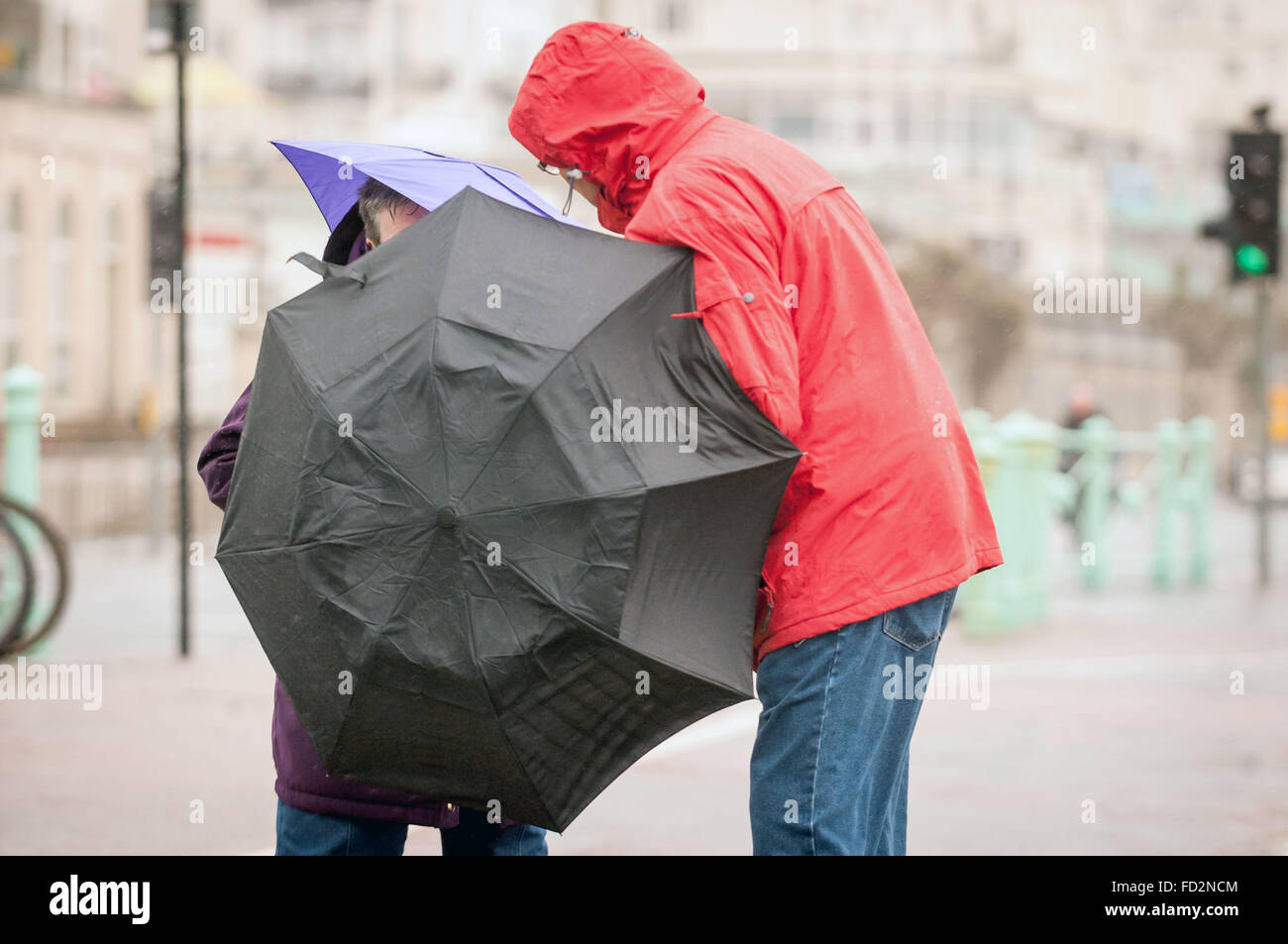 Struggling with wind hi-res stock photography and images - Alamy