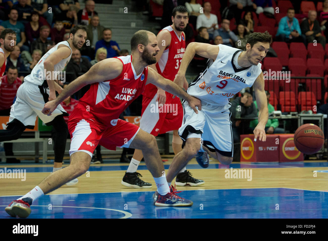 Zeljko Sakic of Sofia, left, and Jiri Welsch of Nymburk in action during the Men FIBA Europe Cup, 5th round, Group P, match CEZ Basketbal Nymburk vs Academic Sofia, in Nymburk, Czech Republic, on Wednesday, January 27, 2016. (CTK Photo/Michal Kamaryt) Stock Photo