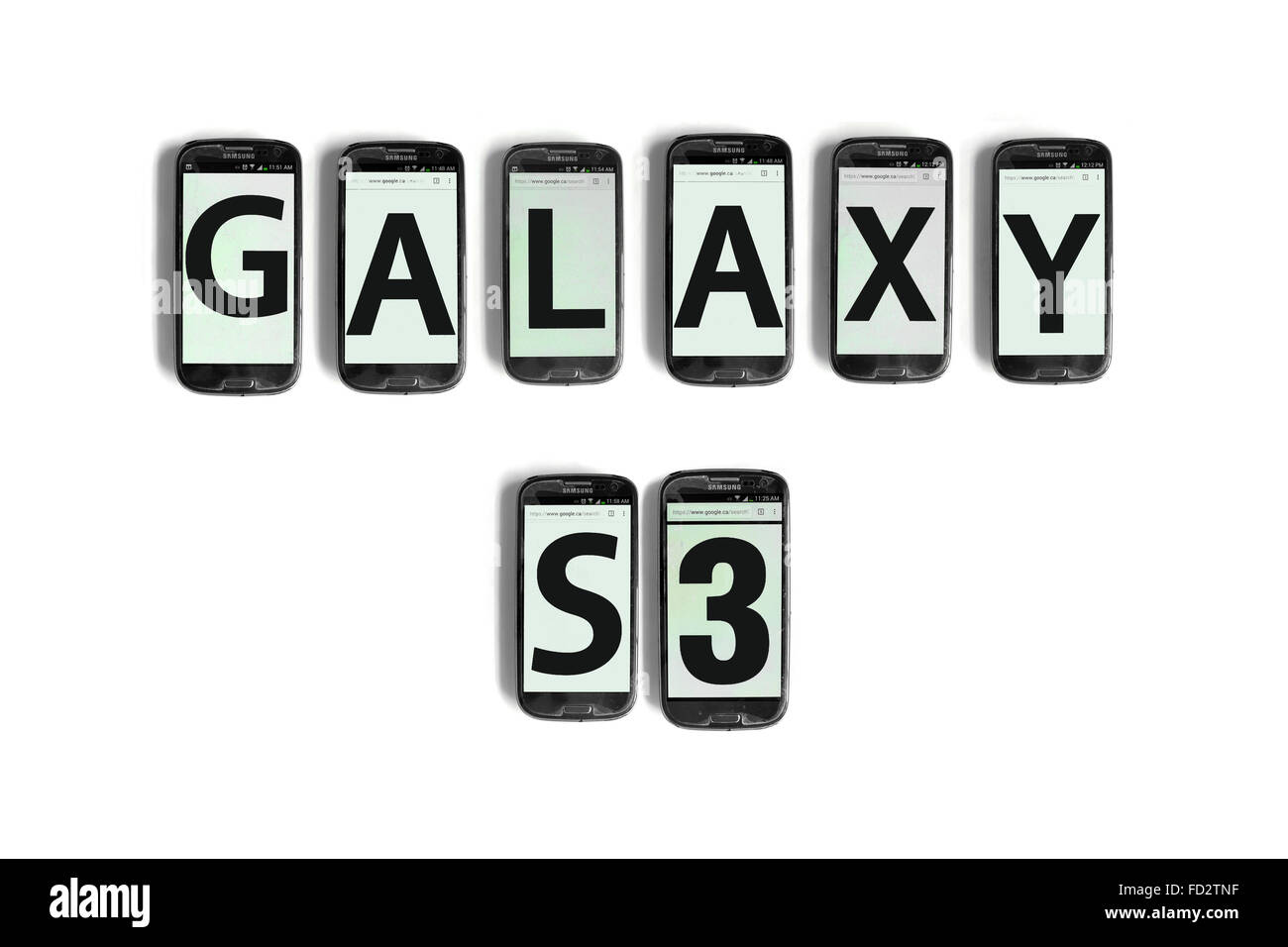 Galaxy S3 written on the screens of smartphones photographed against a white background. Stock Photo