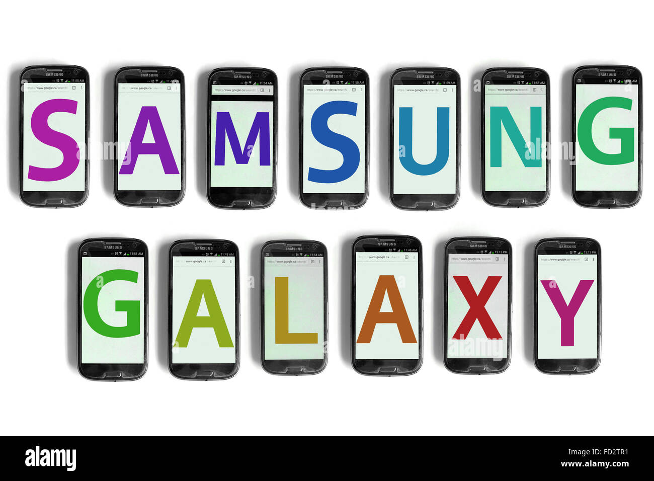 Samsung Galaxy spelled on the screens of smartphones photographed against a white background. Stock Photo