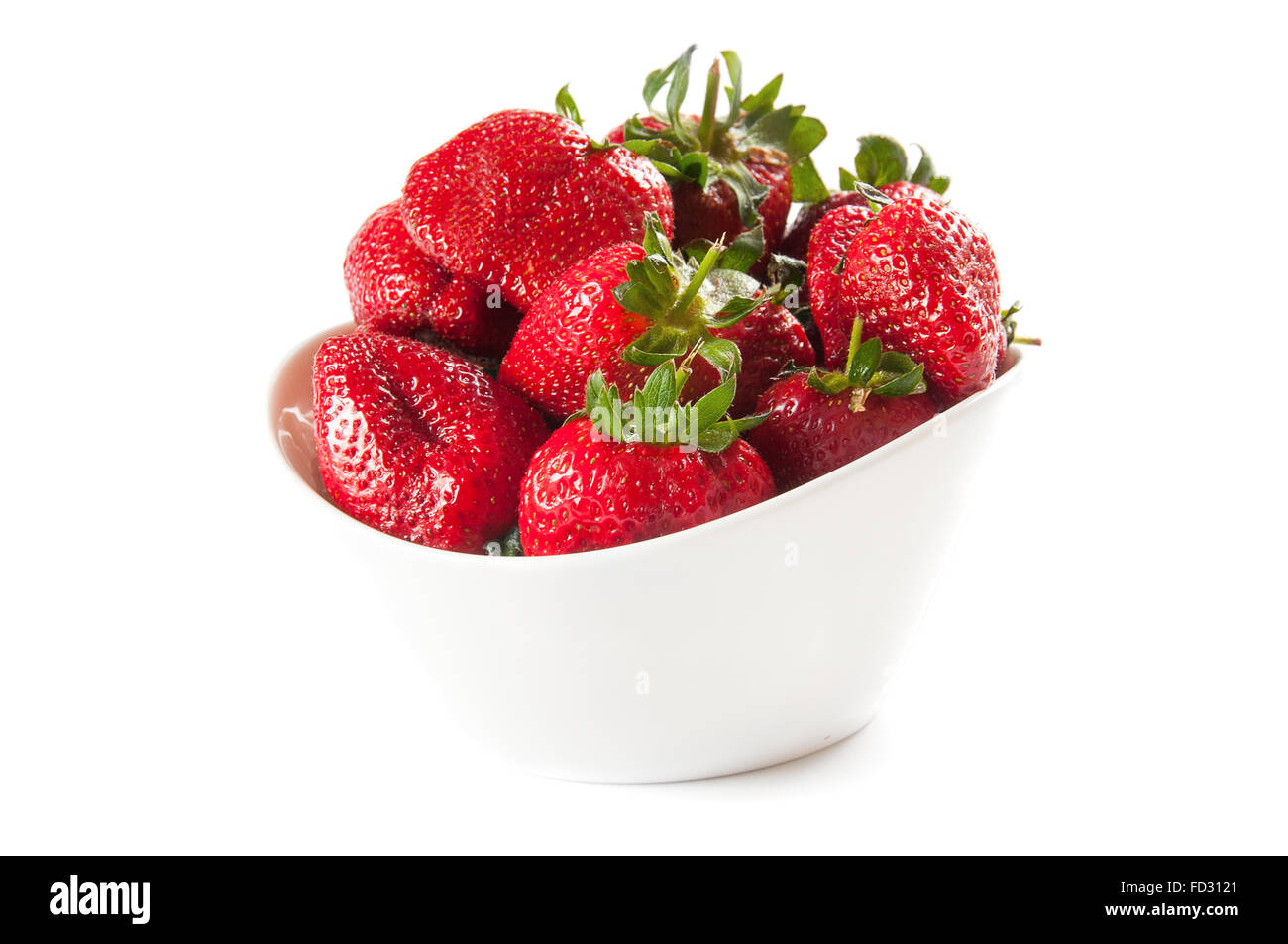 Strawberries in bowl isolated on white background Stock Photo - Alamy