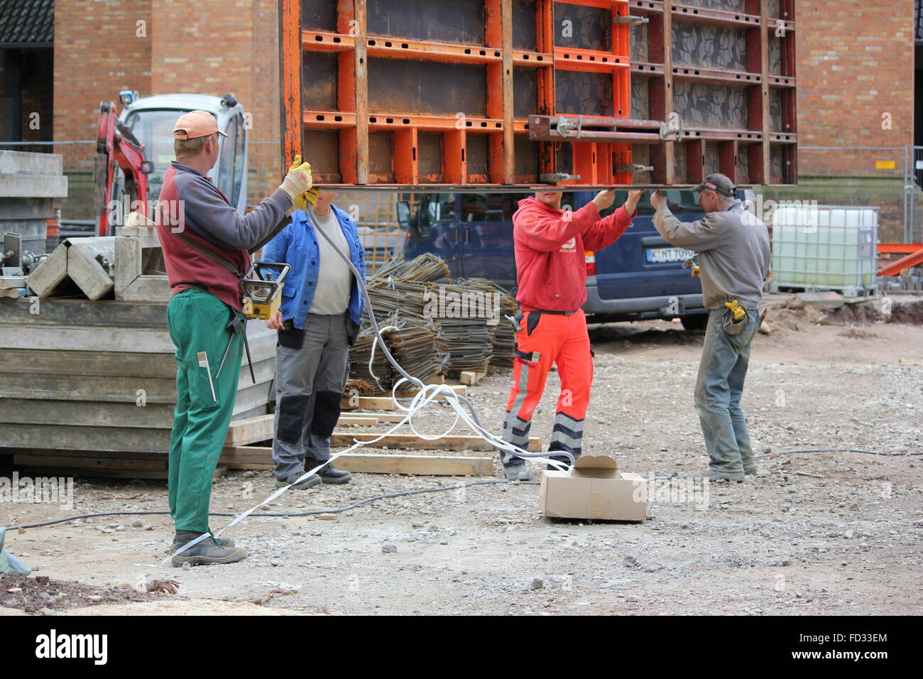 worker at a building-site in Bonn, Germany Stock Photo - Alamy