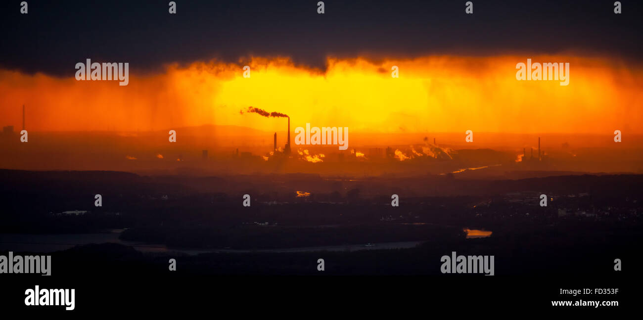 Aerial view, Marl Chemical Park in the backlight after a rainstorm, evening sun, golden light,industrial romanticism, industrial Stock Photo