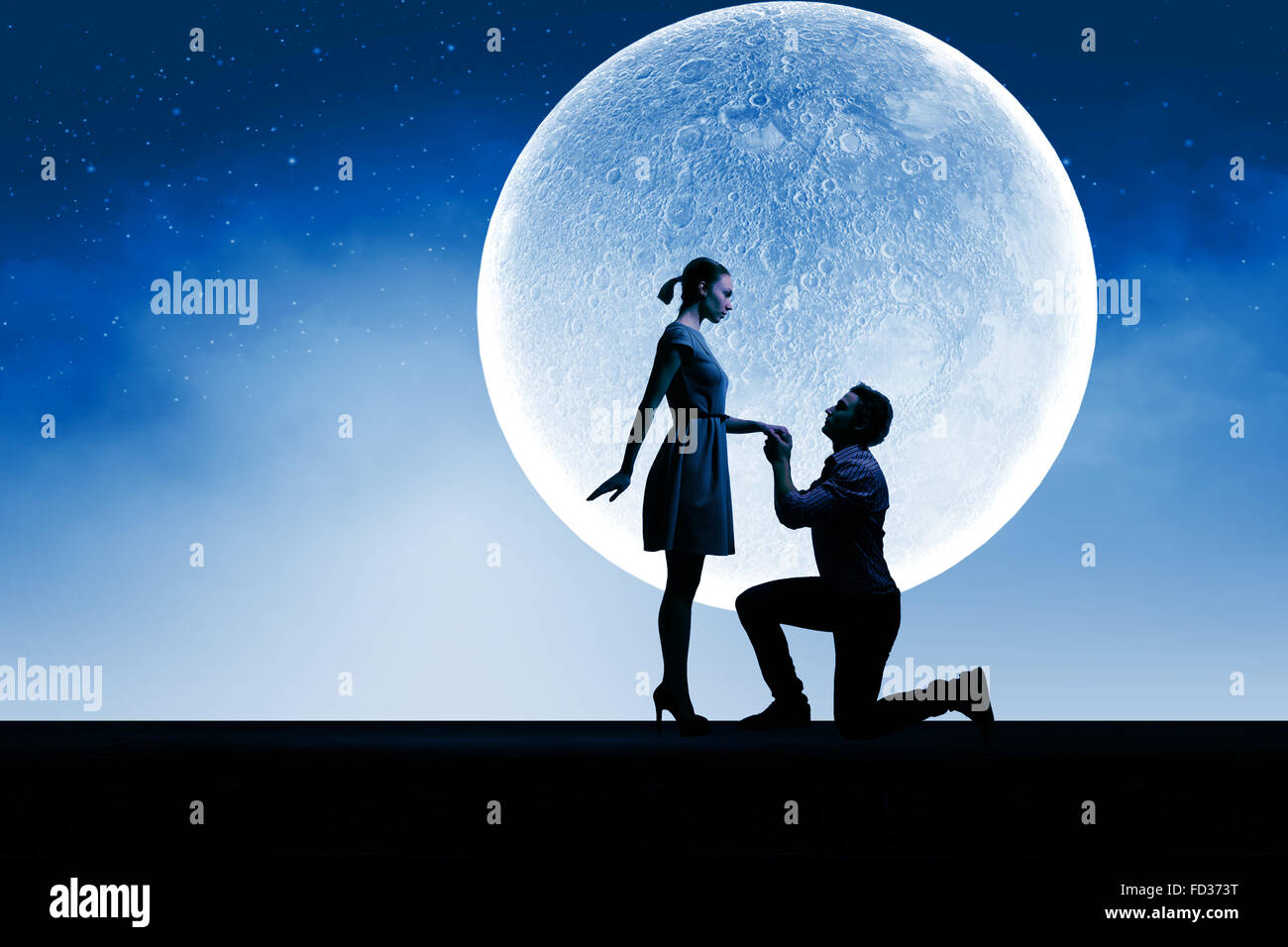 Silhouettes of romantic couple under the moon light Stock Photo - Alamy