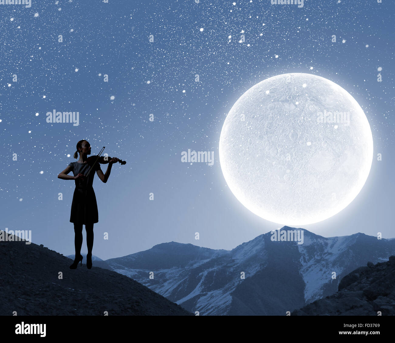 Silhouette of woman playing violin at night Stock Photo - Alamy