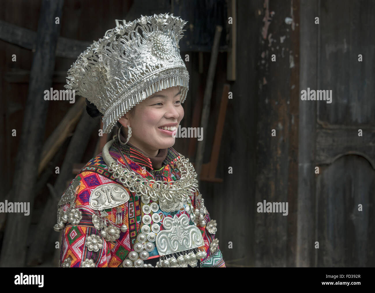 Portrait of a Short Skirt Miao woman in traditional attire #2, Datang Village, Guizhou Province, China Stock Photo