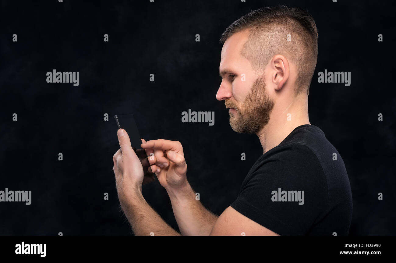 Man using smartphone or tablet pc. Stock Photo