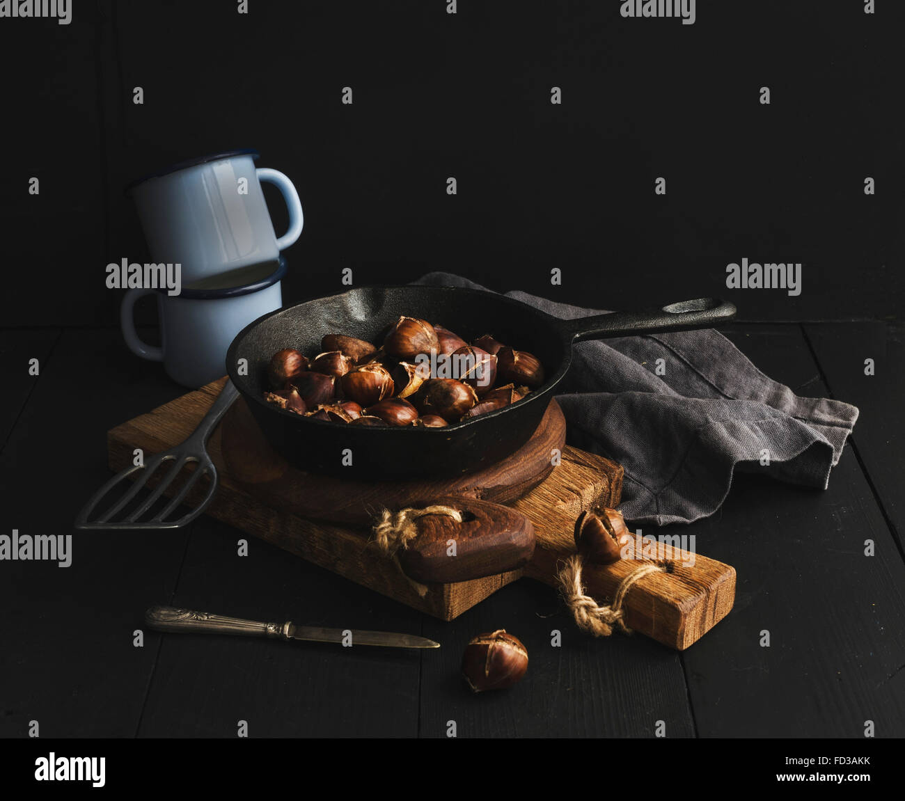 Chestnuts roasting in a pan Stock Photo Alamy