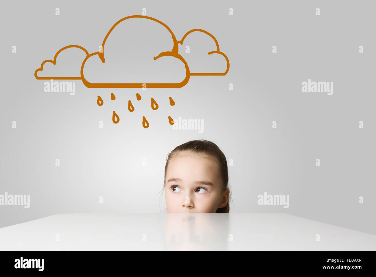 Little cute girl looking at raining cloud Stock Photo - Alamy