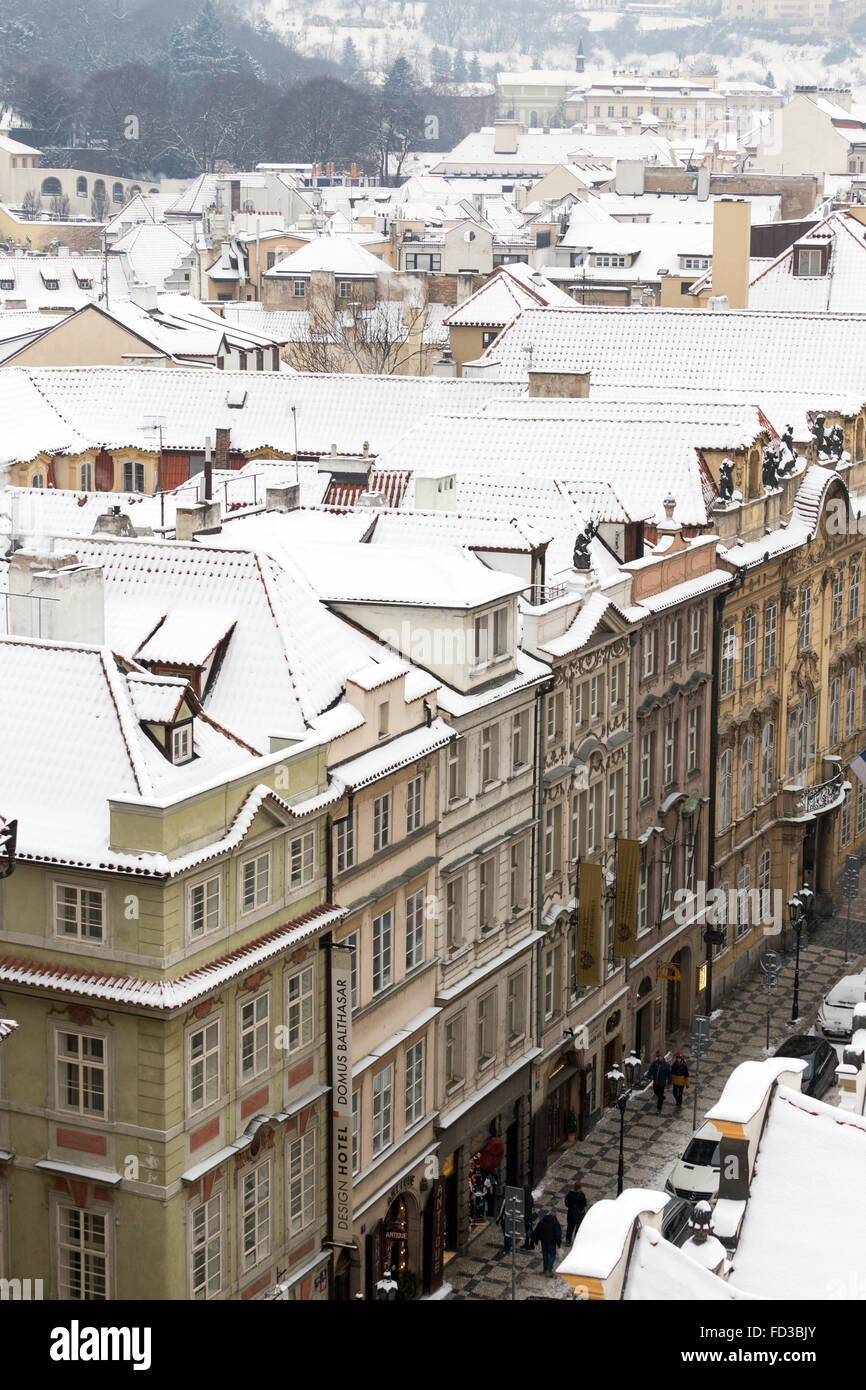 Snowy  roofs of the Lesser town Prague in winter, Mostecka street, Czech republic, Europe Stock Photo