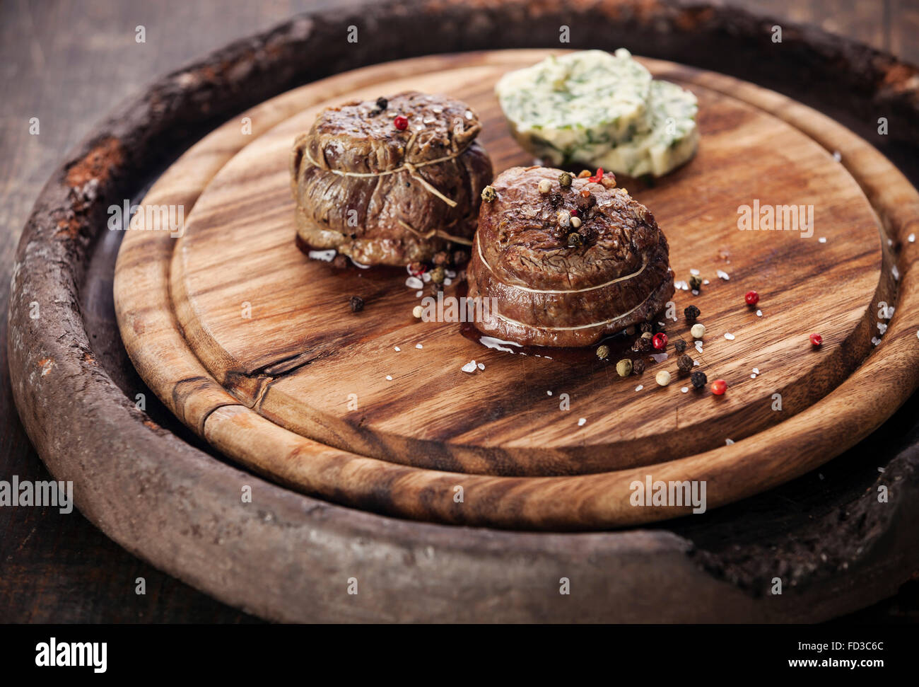 Beef steak filet mignon and butter with herbs Stock Photo