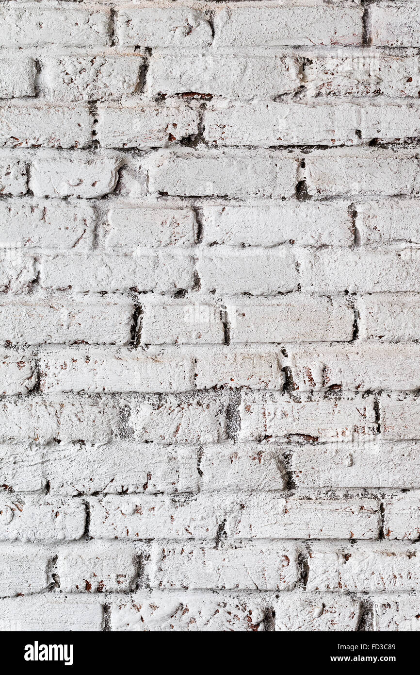Abstract background old white brick wall with cracks and scratches ...