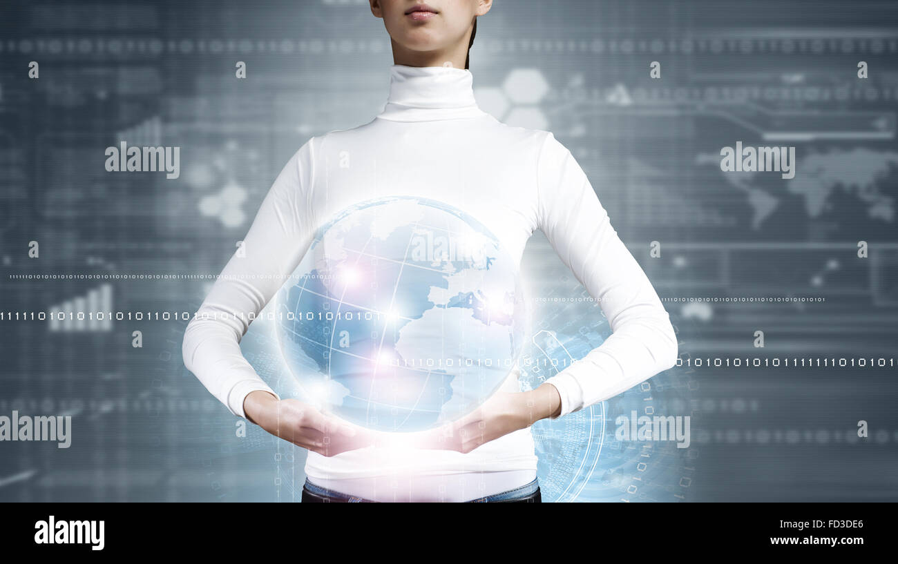 Young woman holding digital Earth planet in hands Stock Photo - Alamy