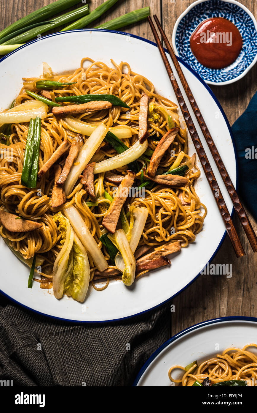 Char Siu Pork Lo Mein on wooden table Stock Photo