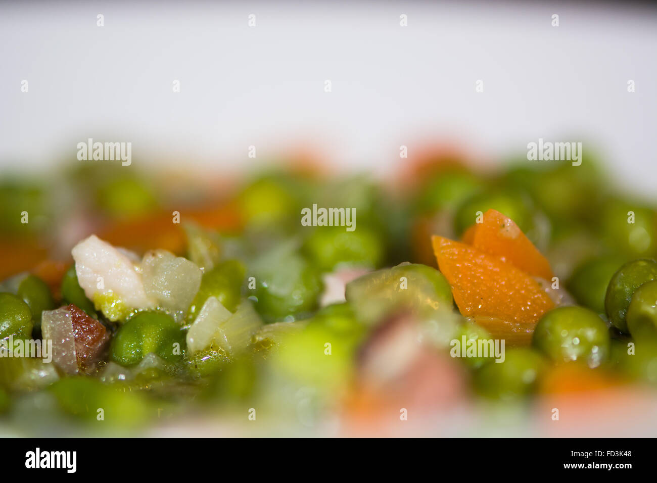 Petit pois a la Francaise looking down, detail of ingredients. A