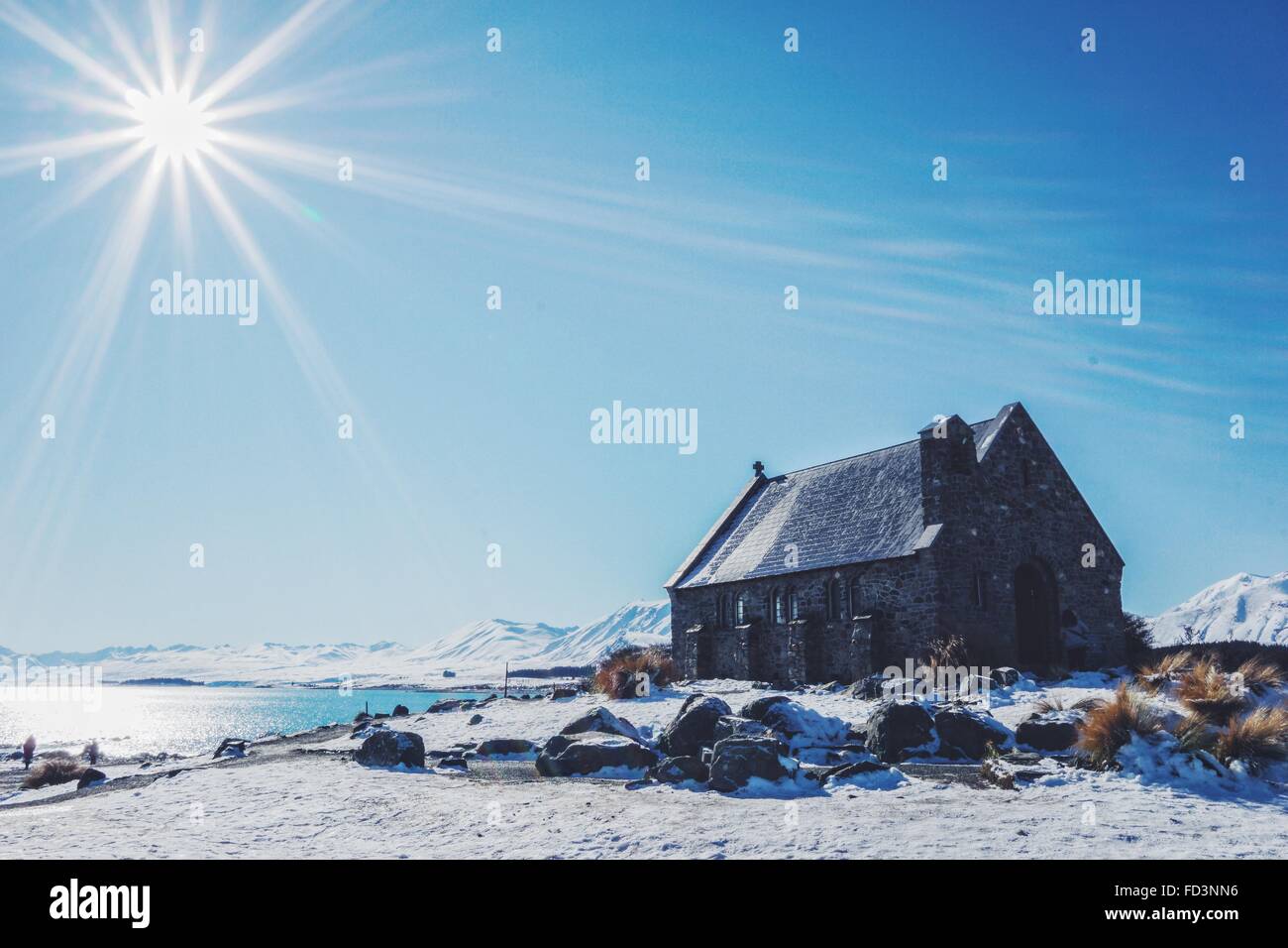 Church of the Good Shepherd in Lake Tekapo on a sunny winters day with snow. Stock Photo