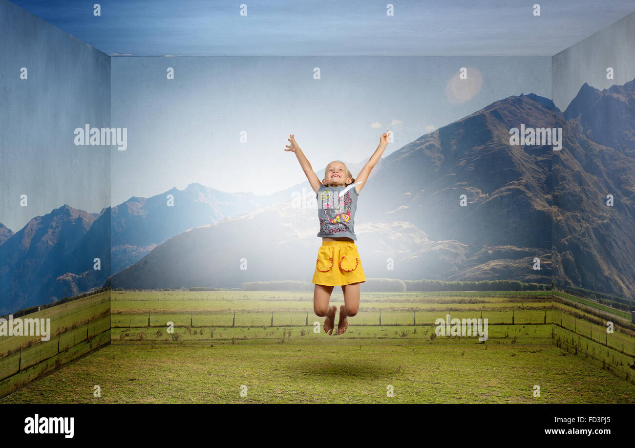 Little cute girl jumping high and flying in sky Stock Photo - Alamy