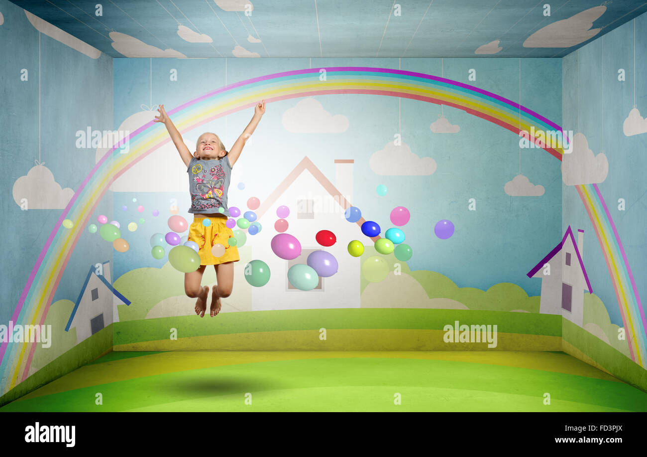 Little cute girl jumping high and flying in sky Stock Photo - Alamy