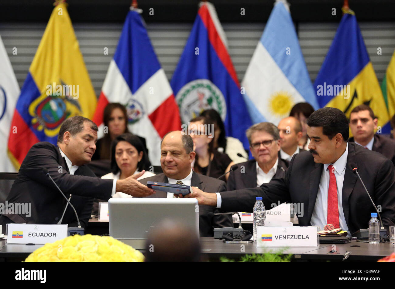 Quito, Ecuador. 27th Jan, 2016. Ecuadorian President Rafael Correa (L
