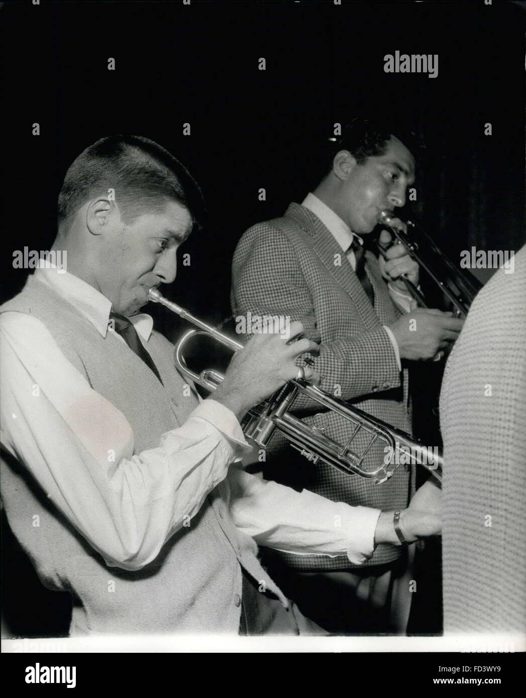 1946 - Jerry Lewis (left) and Dean Martin practice on their trombone and trumpet, the noisy, shrieking duet which is a hilarious part of their act. Martin and Lewis are Howling success at Palladium. Putting on one of the noisiest and craziest turns the Palladium has ever seem, Dean Martin and Jerry Lewis acorad a tromendous success at the start of their two weeks appearance. Stars of eight Paramount films, Martin and Lewis are also incomparable theatre and night club entertainers, while their gramphone records also have an international following. Martin started his theatrical career as a d Stock Photo