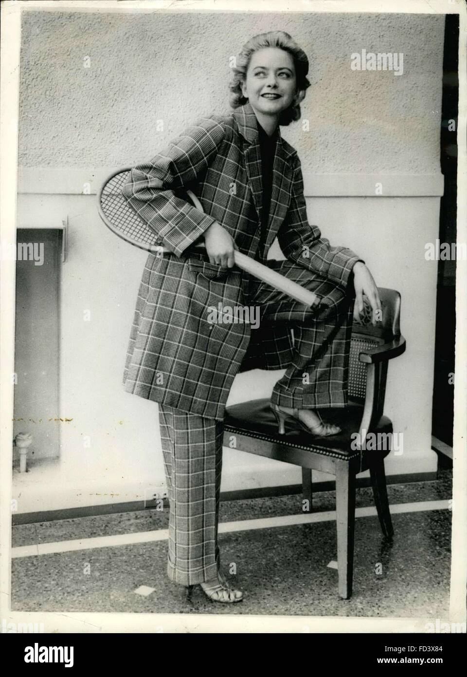 1956 - Mannish Modes for M' Lady: From America comes this advanced summer model for the Miss Modern of the Tennis Courts. The material is cotton tweed and is featured in Green and White Check, comprising tailored slacks with turn-ups and a three-quarter length coat with pockets. © Keystone Pictures USA/ZUMAPRESS.com/Alamy Live News Stock Photo