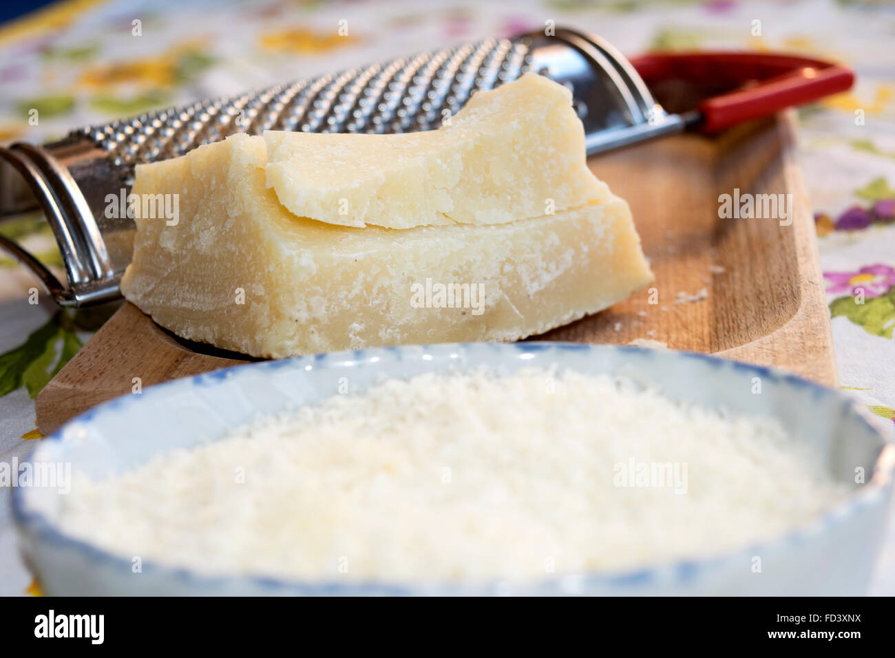 rind and pulp of parmesan cheese ready to grate Stock Photo - Alamy