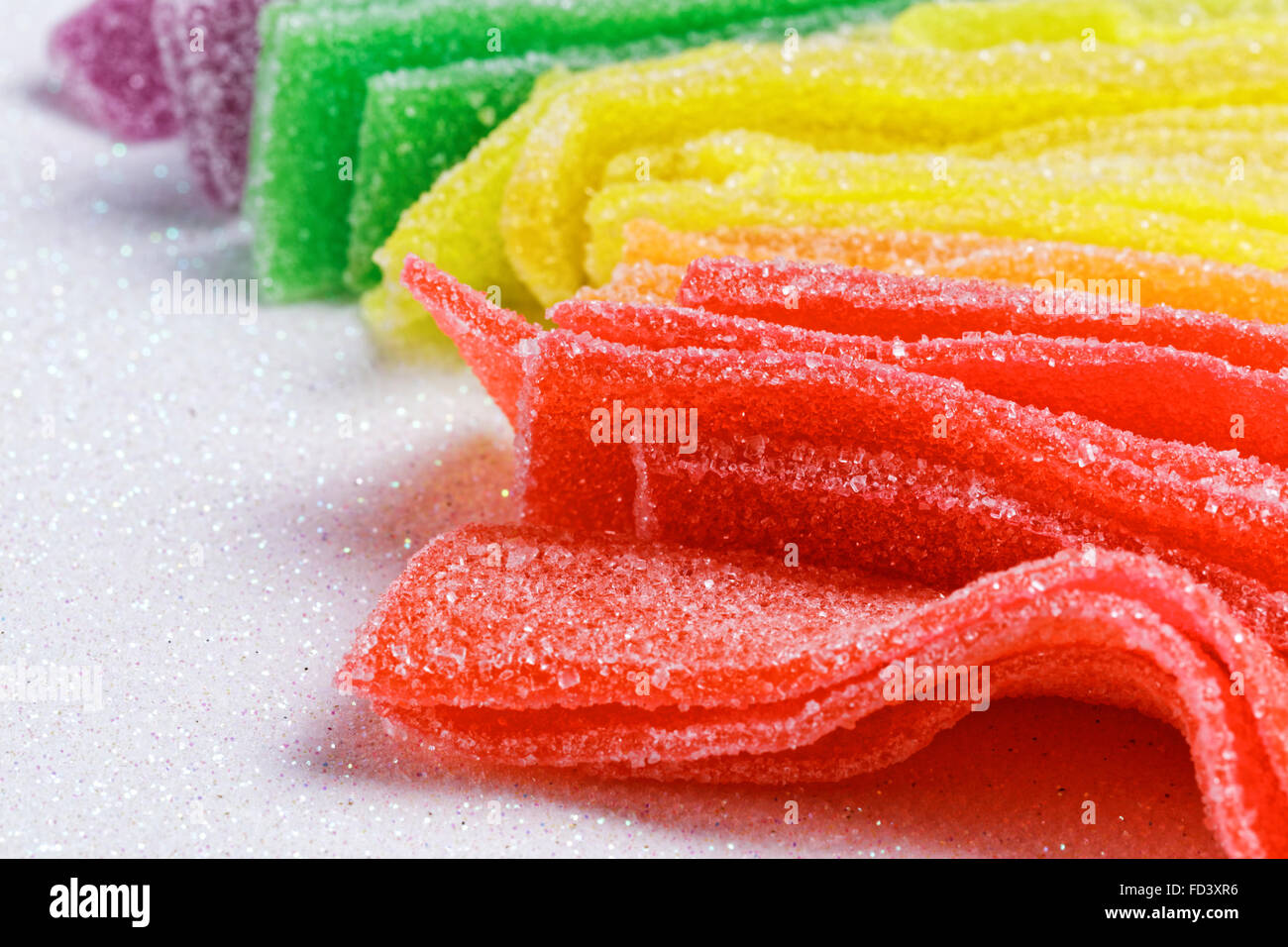 Colorful sugar jelly candy strip over white background Stock Photo Alamy