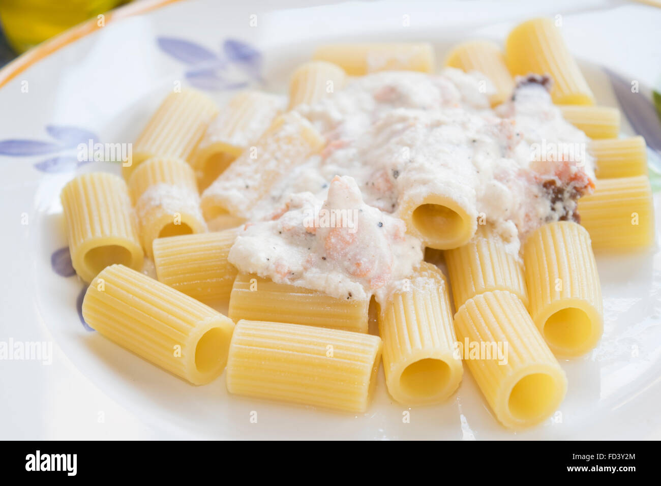 Rigatoni With Smoked Salmon Cream And Black Pepper Stock Photo - Alamy