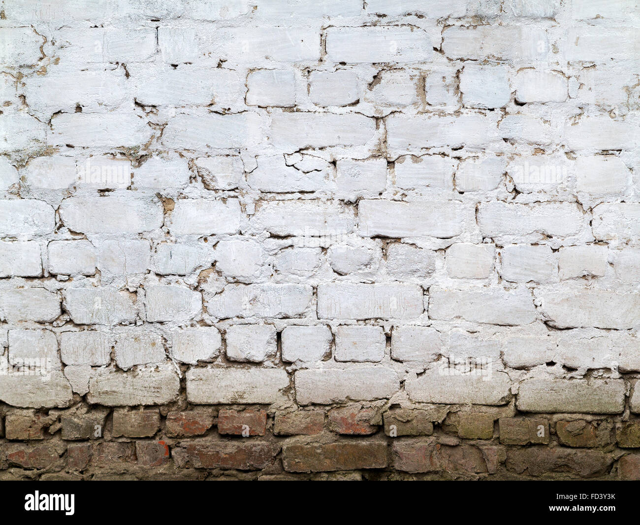 Abstract background old white brick wall with cracks and scratches ...