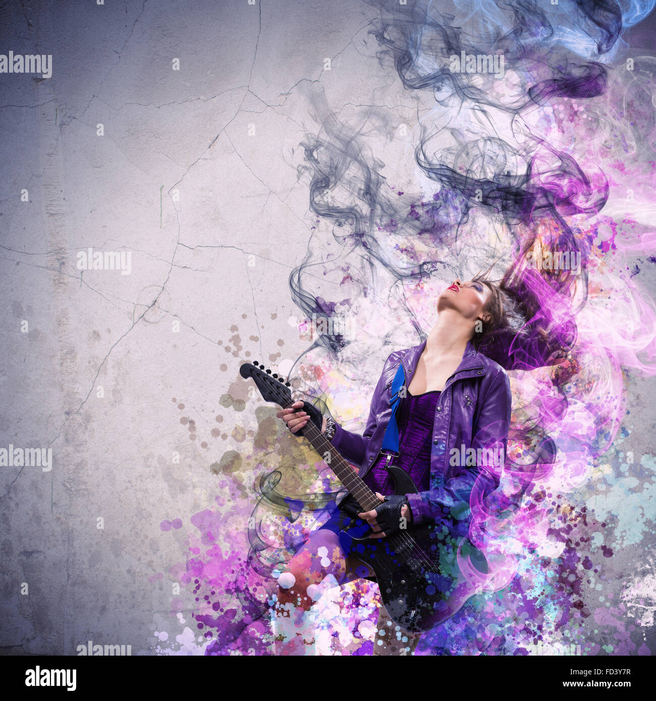 Young attractive rock girl playing the electric guitar Stock Photo - Alamy