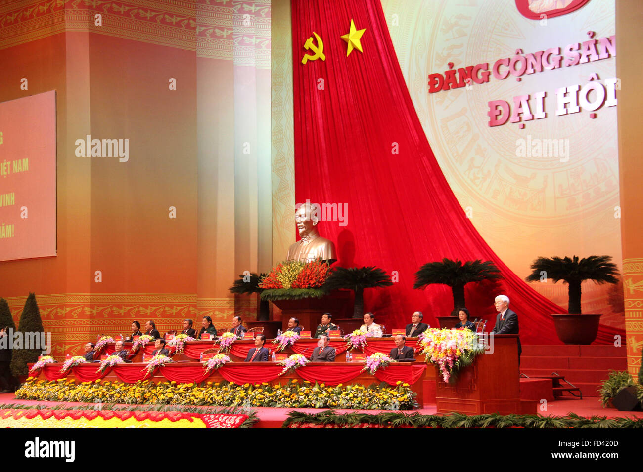 Hanoi, Vietnam. 28th Jan, 2016. General Secretary of the newly-elected 12th Communist Party of Vietnam (CPV) Central Committee Nguyen Phu Trong (1st R) addresses the closing session of the 12th National Congress of the CPV in Hanoi, capital of Vietnam, Jan. 28, 2016. 1,510 delegates representing over 4.5 million Communist Party of Vietnam (CPV) members attended the congress. © Yan Jianhua/Xinhua/Alamy Live News Stock Photo