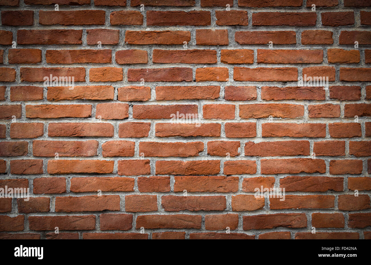 Rustic wall made with clay bricks of different lengths Stock Photo Alamy