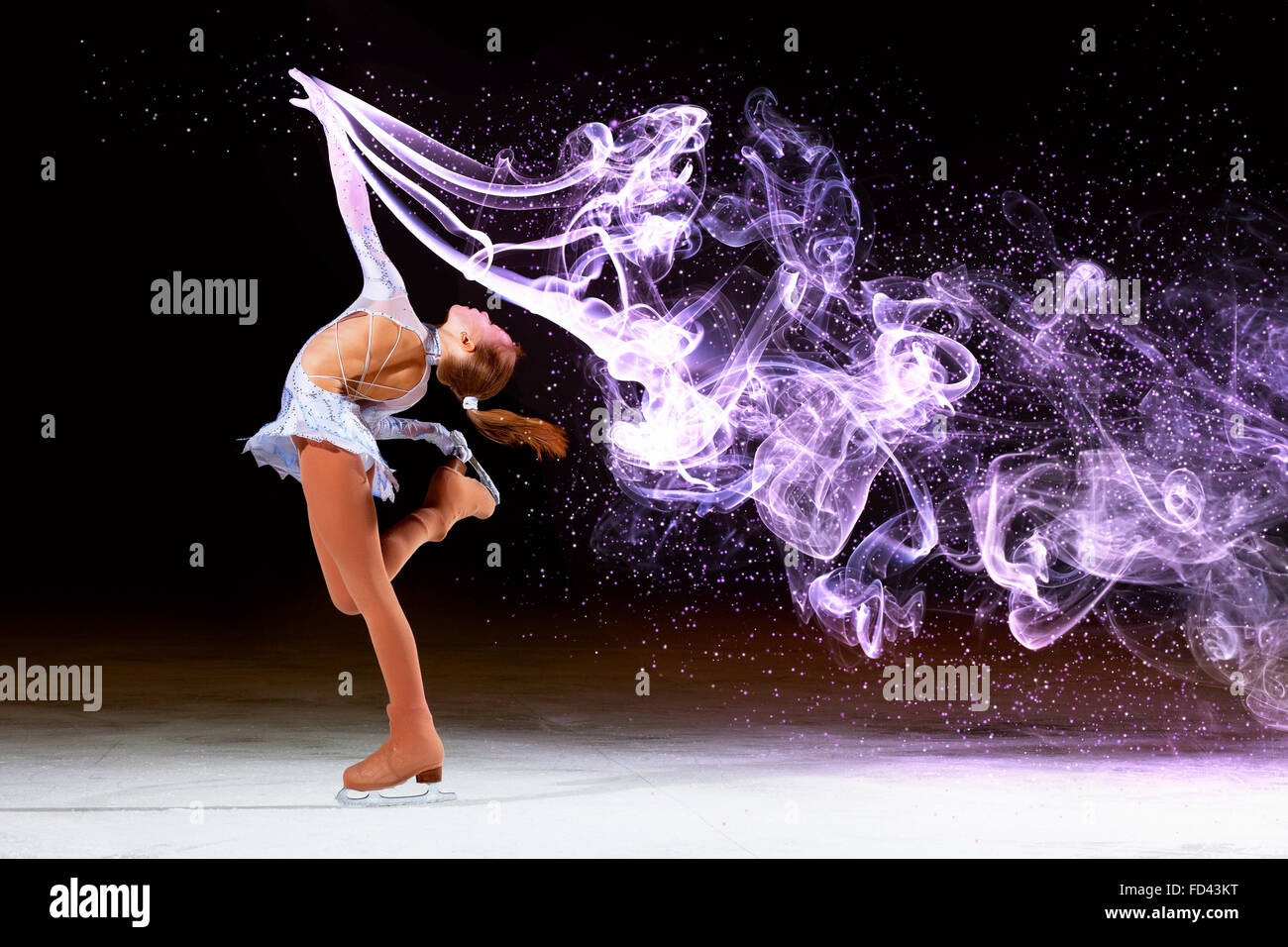 Little girl figure skating at sports arena Stock Photo Alamy