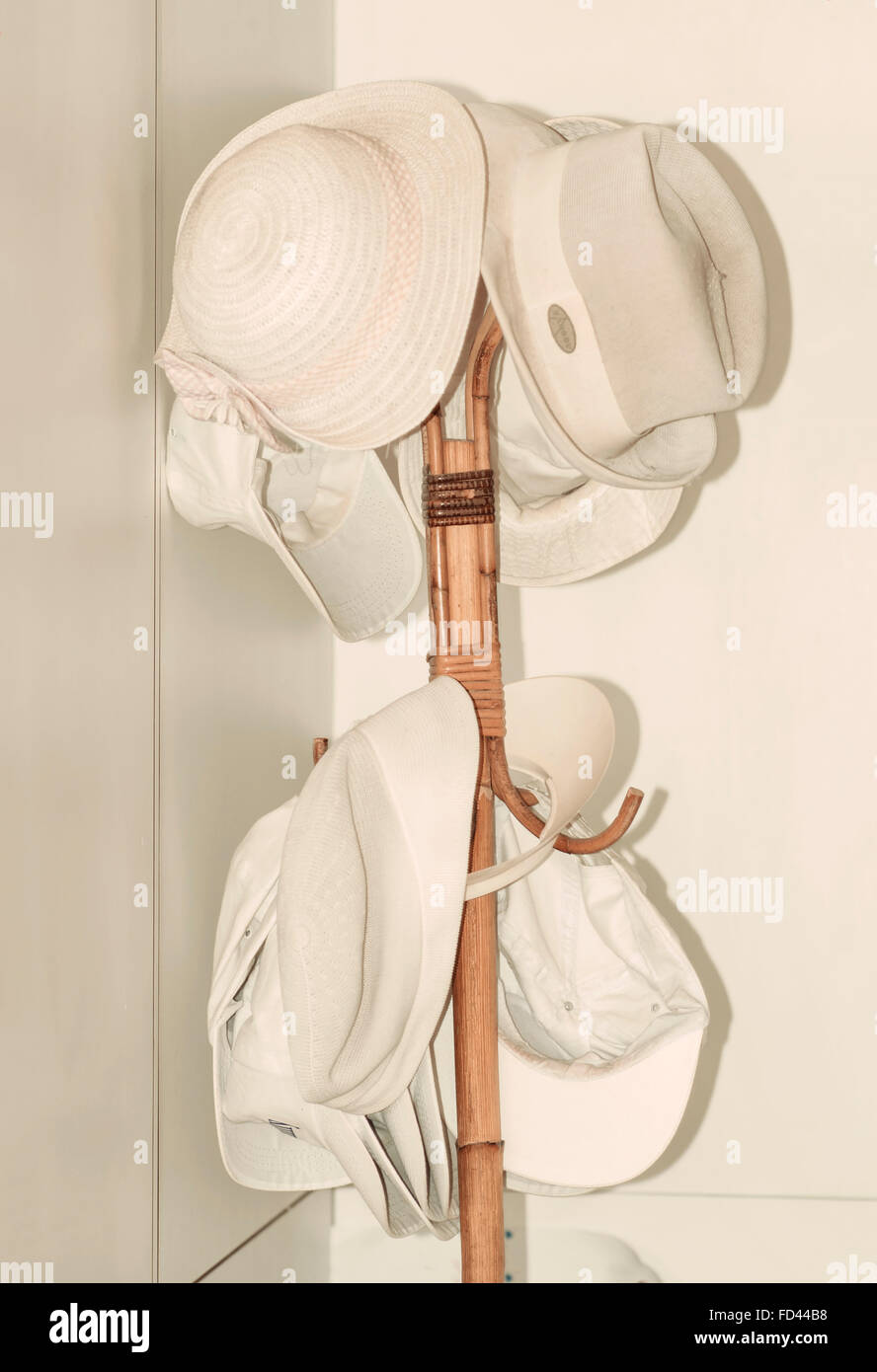 Hat stands with white hats Stock Photo Alamy