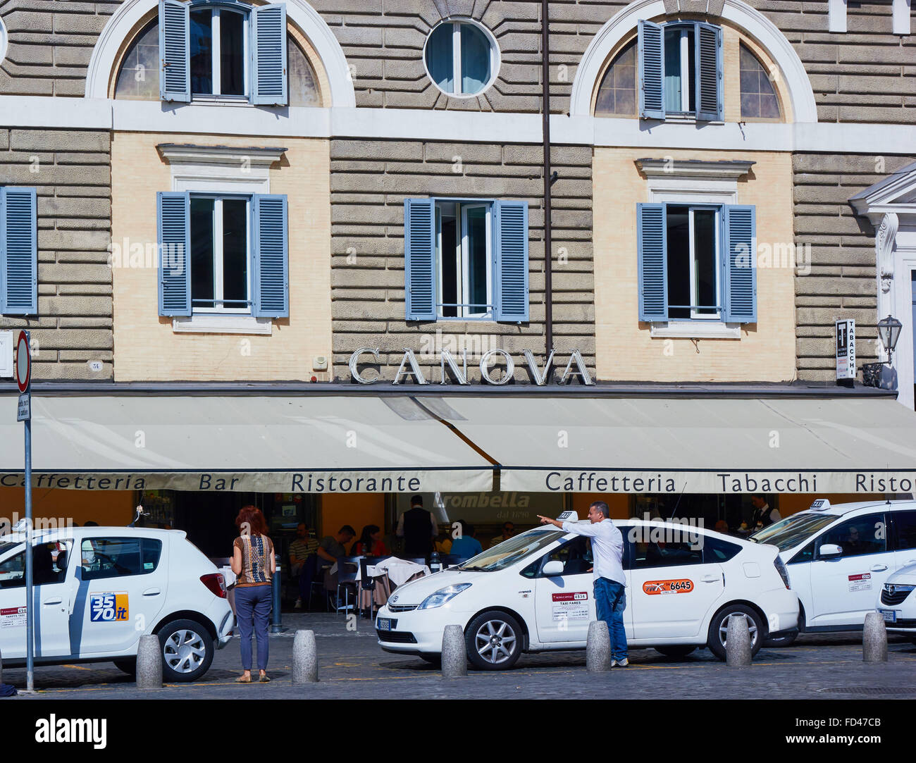 Taxis queuing outside Cafe Canova Piazza Del Popolo Rome Lazio Italy Europe Stock Photo