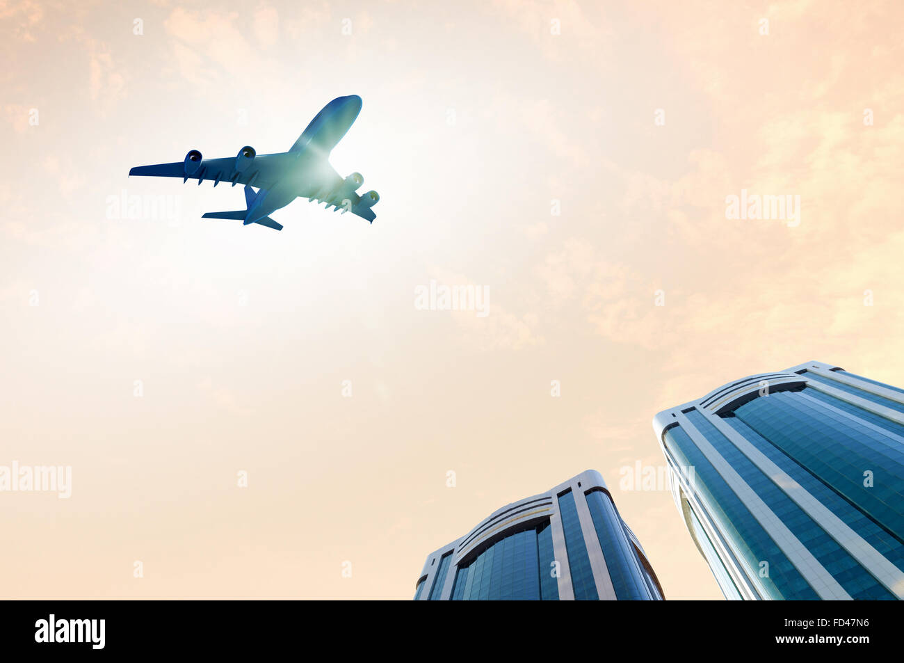 Image of airplane flying above skyscrapers. Bottom view Stock Photo - Alamy