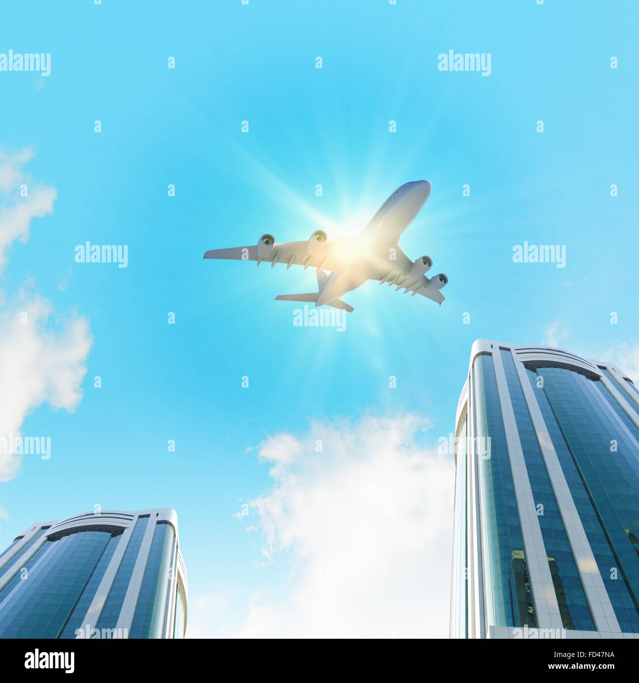 Image of airplane flying above skyscrapers. Bottom view Stock Photo - Alamy