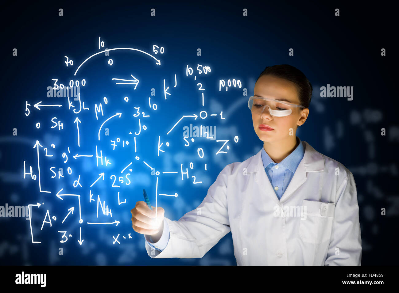 Young woman researcher in medical uniform drawing chemistry formulas