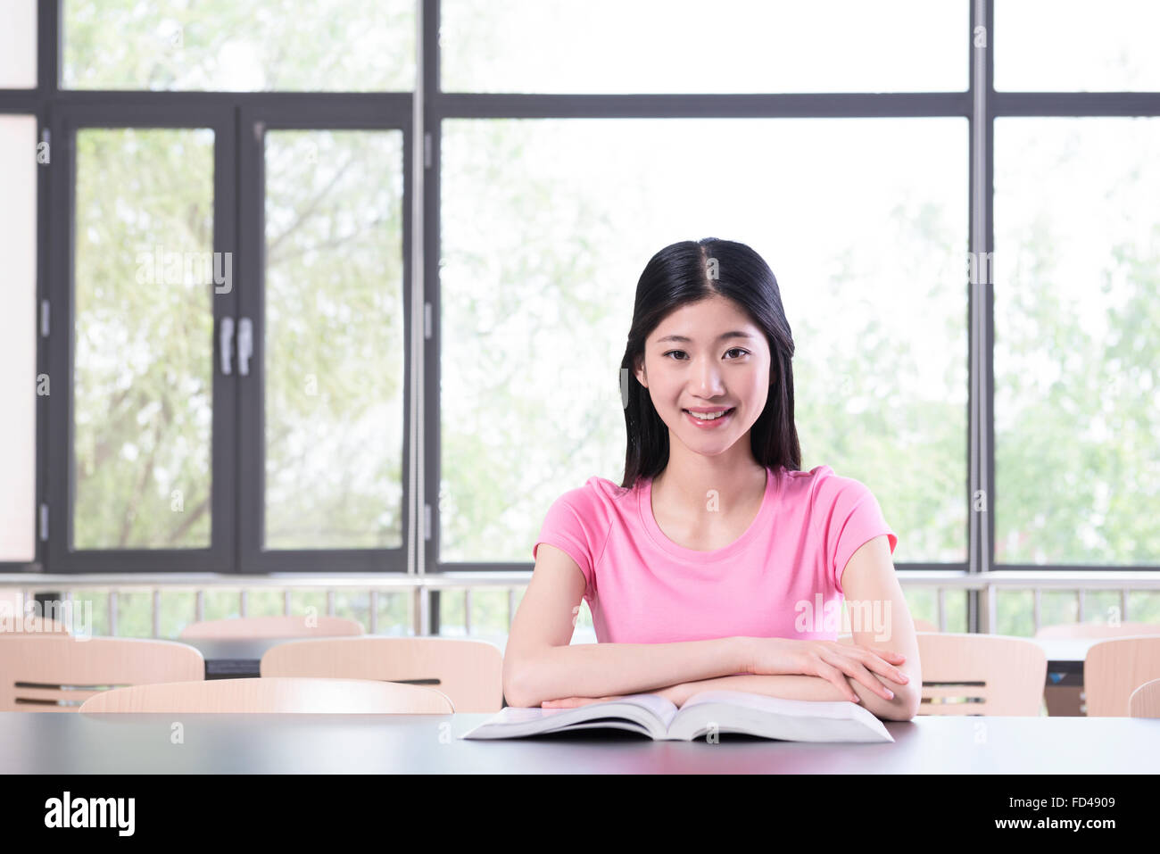 College student studying in library Stock Photo - Alamy
