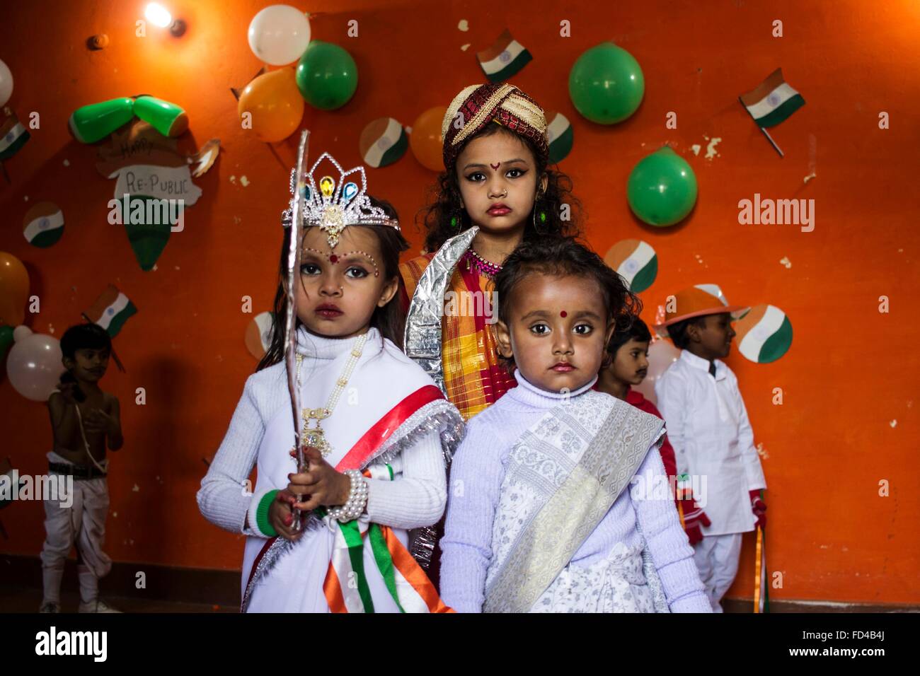 Uttar Pradesh, India. 26th Jan, 2016. Girls dressed as Bharat mata, Rani laxmi bai, gathered to celebrate 67th republic day in Tarang pre school at Karwi /Chitrakoot . Republic Day honors the date on which the Constitution of India came into force on 26 January 1950 replacing the Government of India Act as the governing document of India. © Akshay Gupta/Pacific Press/Alamy Live News Stock Photo