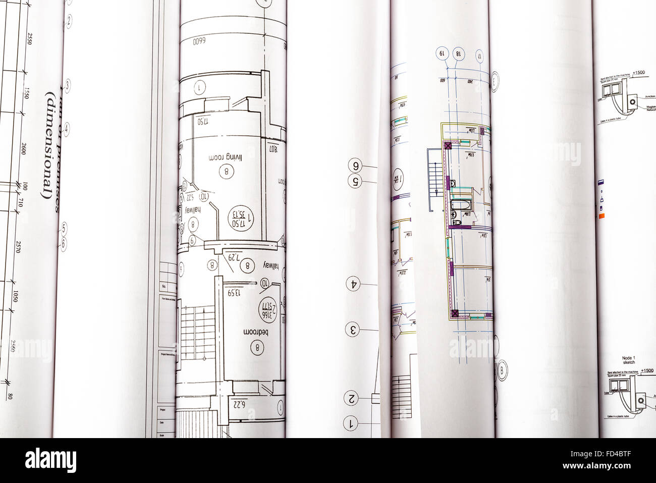 Architectural blueprint rolls on white Stock Photo - Alamy